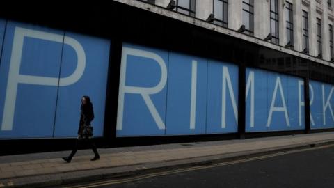 The Primark logo in a shop window