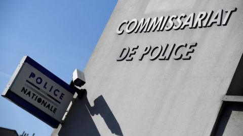 A police station sign in Paris