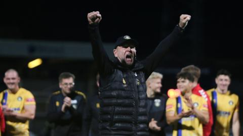 Manager Russ Wilcox celebrates Gainsborough Trinity's FA Cup fourth qualifying round win against Hartlepool