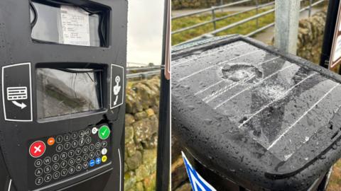 A parking meter with damage to its screen, which appears to have been smashed