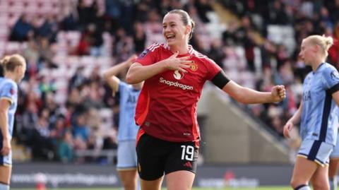 Elisabeth Terland celebrates scoring for Manchester United