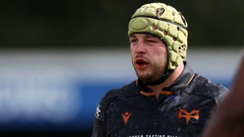 Harri Deaves awaits the next action for Ospreys