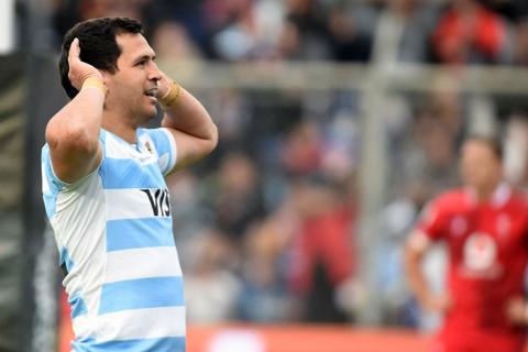 Argentina's Matias Moroni celebrates while cupping his ears