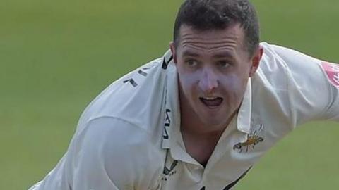 Daniel Worrall bowls for Surrey