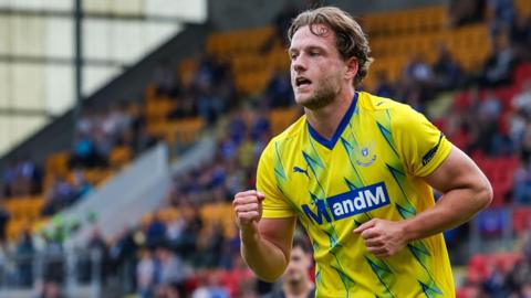 Jamie Gullan celebrates after scoring a penalty for St Johnstone against Greenock Morton