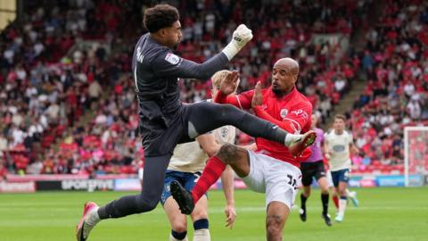 Owen Goodman was sent off for a high challenge on Barnsley's David McGoldrick