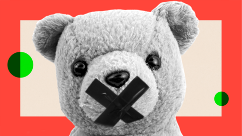 A teddy with a thick black cross over its mouth