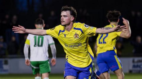 Barry Town's Ieuan Owen scores and celebrates 