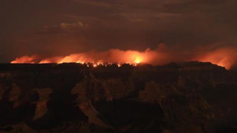 Wildfire burning over grand canyon