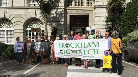 Protesters gather outside Surrey County Hall against Brockham well site application