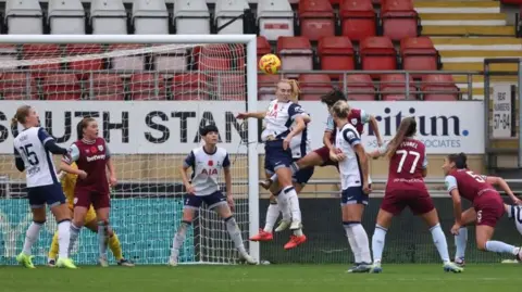 Riko Ueki scores for West Ham against Tottenham Hotspur.