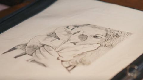 A fine art print on a white A4 piece of paper