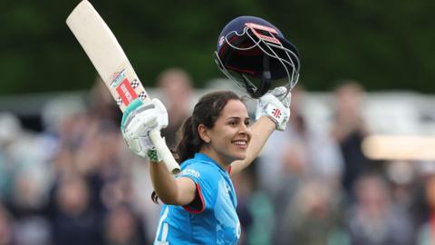 England's Maia Bouchier celebrates hitting a century against New Zealand