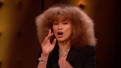 Michelle de Swarte smiling while talking on the set of The Claudia Winkleman Show