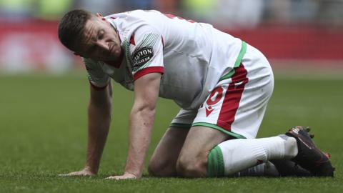 Paul Mullin dejected at Wembley