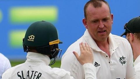 Nottinghamshire's Luke Fletcher is congratulated after taking the opening wicket against Derbyshire