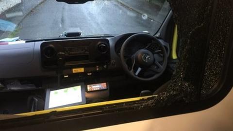 Smashed window inside ambulance