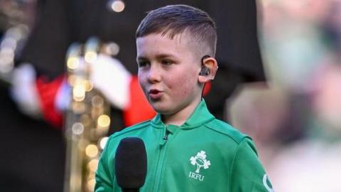 Stevie Mulrooney singing at aviva Stadium