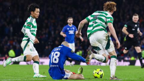 Rangers winger Vaclav Cerny is fouled by Celtic defender Liam Scales