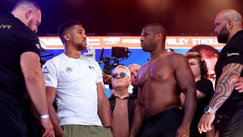 Anthony Joshua faces off with Daniel Dubois