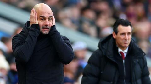 Pep Guardiola holds his hands to his head in despair he as watches his Manchester City side lose at Aston Villa