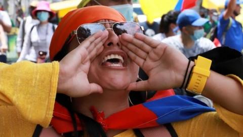 A protester shouts slogans as demonstrators take to the streets in anti-government protests demanding the end to police violence, economic support as the coronavirus disease (COVID-19) pandemic batters incomes, and the withdrawal of a health reform, in Cali, Colombia May 12, 2021.