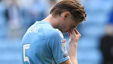 Jack Rudoni is dejected after a Coventry City defeat