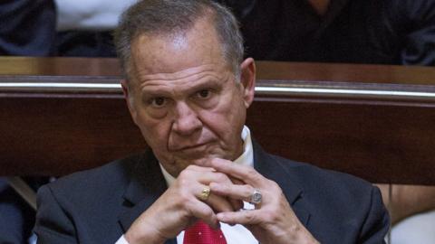 Embattled Alabama Chief Justice Roy Moore listens to closing arguments during his ethics trial before the Alabama Court of the Judiciary on 28 September