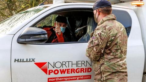 Soldier talks to Northern Powergrid employee