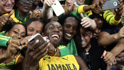 Usain Bolt taking selfies after the Rio 2016 100m final