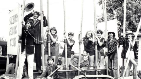 Members of Sudbury Rowing Club with their oars