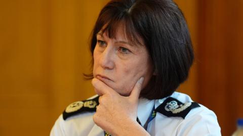 Jo Farrell, the chief constable of Police Scotland, looking concerned and thoughtful with her hand on her chin 