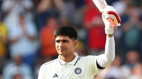 India captain Shubman Gill celebrates hitting a century