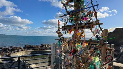 The Christmas tree at La Vallette Bathing Pools in St Peter Port is made from materials saved from landfill and found during beach cleans.