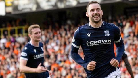 Drey Wright celebrates scoring for Dundee