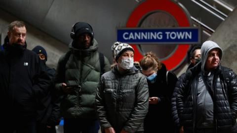 Commuters at Canning Town