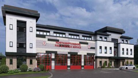 An artist's impression of a three storey fire station at Moulton Road station in Northampton. It is a white building with four red doors to fire engine bays on the ground floor. Above the bays it says Northamptonshire Fire and Rescue Service.