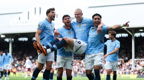 Man City players celebrate