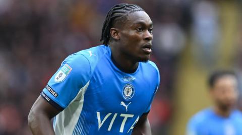 Tanto Olaofe in action for Stockport County during the 2025-26 season