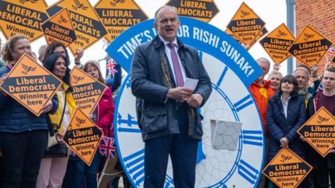 Liberal Democrat leader Ed Davey addresses newly elected Liberal Democrat councillors and campaigners on Windsor Bridge