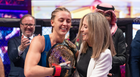 Dakota Ditcheva celebrates with her mum Lisa Howarth after beating Talia Santos for the PFL flyweight title