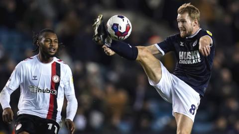 Millwall midfielder Billy Mitchell controls the ball against Bristol City