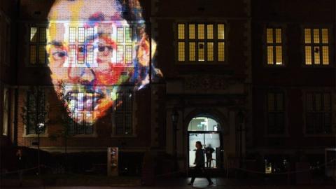 An image of Dr Martin Luther King Jr – by artist Derek Russell - projected on to a Newcastle University building to mark the launch of Freedom City 2017