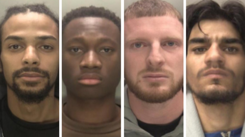 A composite of the mugshots of four men. From left to right is: a man with long dark hair and a beard, wearing a dark shirt; a man with short dark hair and a brown shirt, a man with short brown hair, a beared and a black shirt with a grey hooded-top; and a man with mid-length dark hair, a blue shirt and white top.