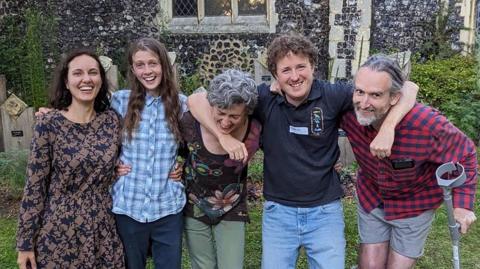 Just Stop Oil protesters Lucia Whittaker De Abreu, Cressida Gethin, Louise Lancaster, Daniel Shaw and Roger Hallam standing in a row