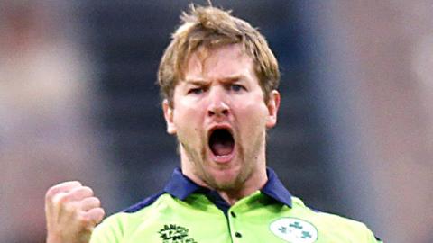 Barry McCarthy celebrates taking the wicket of England's Dawid Malan in the Men's T20 World Cup in November