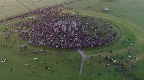 Thousands of people greeted the sunrise at Stonehenge on summer solstice.
