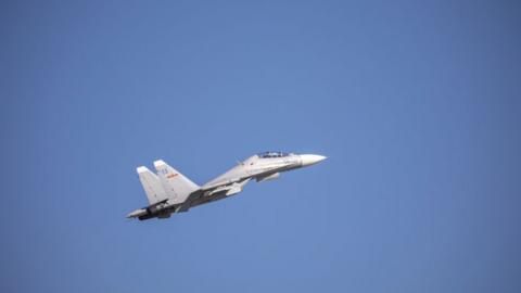 A J-11 air fighter takes off from a PLA military airport in a training session in east China's Zhejiang province in late August 2021.