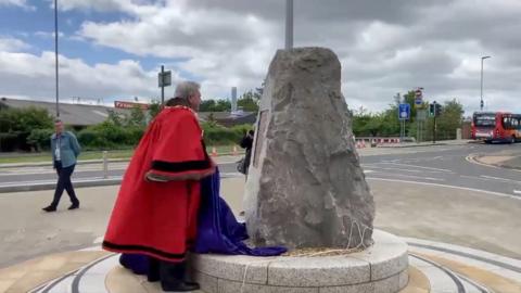 The unveiling of the sculpture