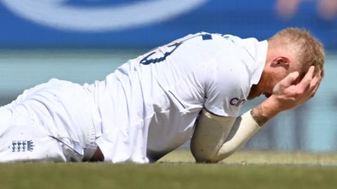 England captain Ben Stokes puts his head in his hands after dropping a caught and bowled chance